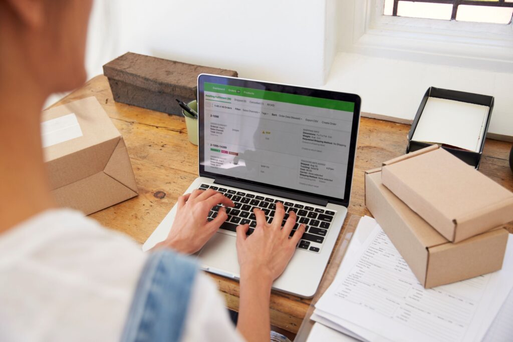 Person working on a B2B platform. Choosing a B2B ecommerce platform for strategic business growth